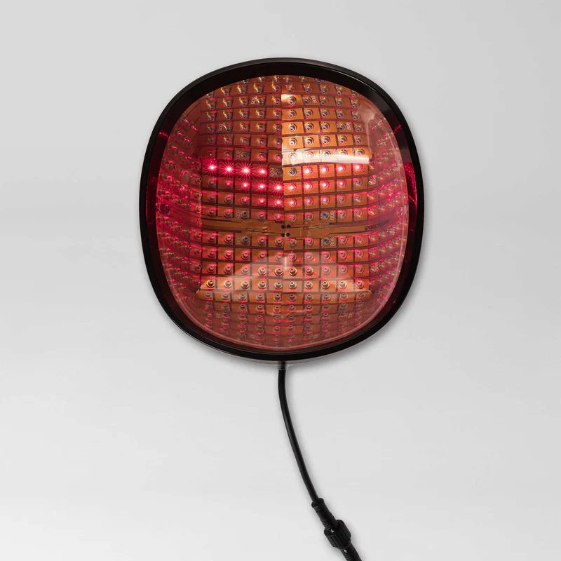 KeraDuo laser cap with its red light diodes lit