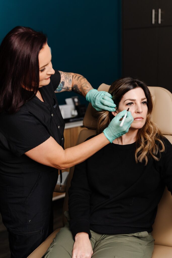 Sarah Sanchez performing microneedling