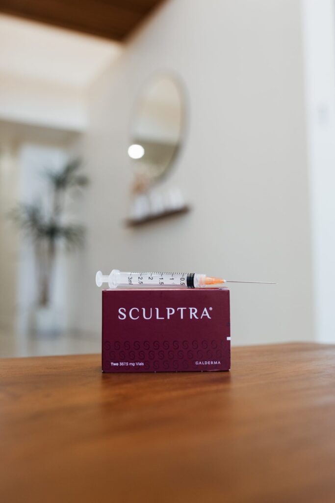 Sculptra box and syringe on a table in the clinic